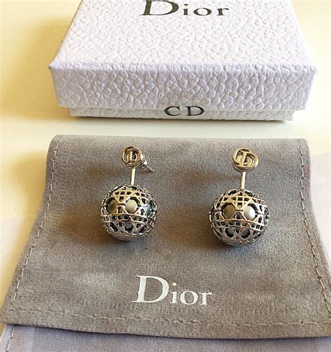 dior silver hoop earrings|christian dior tribal earrings.